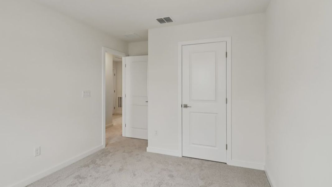 Furnished interior view inside a new home in Cyrene at Harmony, St. Cloud (Image 25).