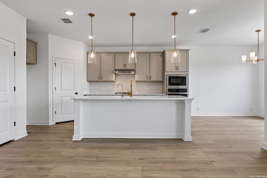 Furnished interior view inside a new home in Nopal Valley, San Antonio (Image 13).