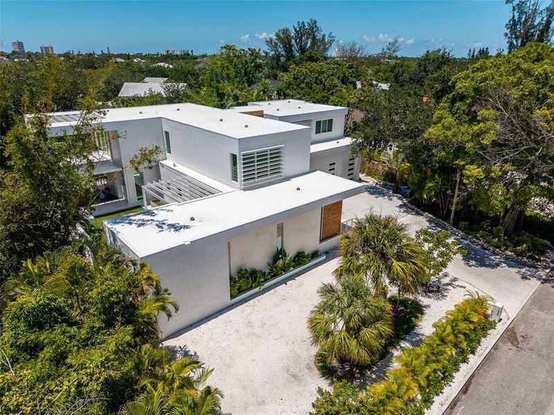 Front exterior of a new home in , Sarasota, FL, highlighting curb appeal (Image 30).