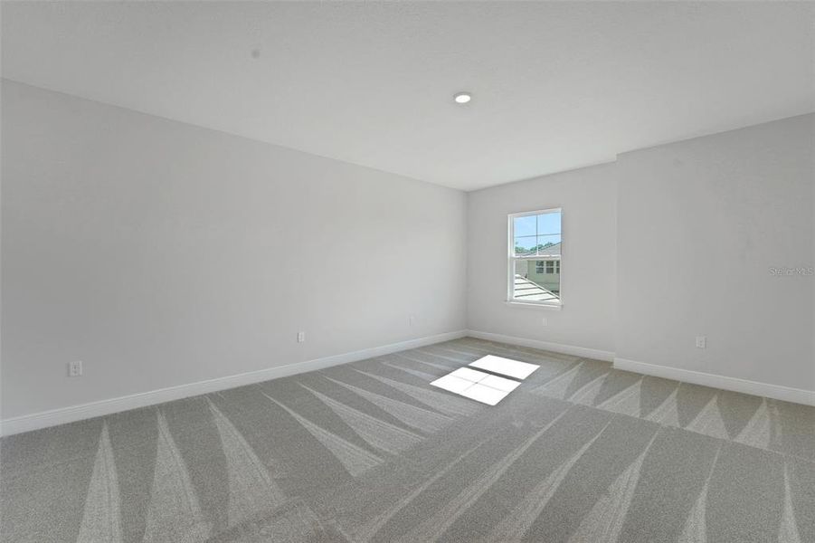 Spacious, unfurnished interior of a new home in Palms at Windermere, Windermere (Image 31).