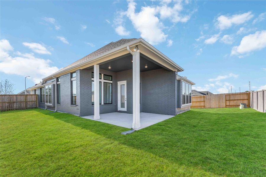 Exterior details and patio area of a home in Arabella on the Prairie, Richmond (Image 3). Exterior details and patio area of a home in Arabella on the Prairie, Richmond (Image 3).