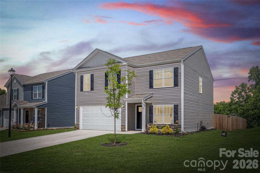 Front exterior of a new home in Patton Cove, Clyde, NC, highlighting curb appeal (Image 21).