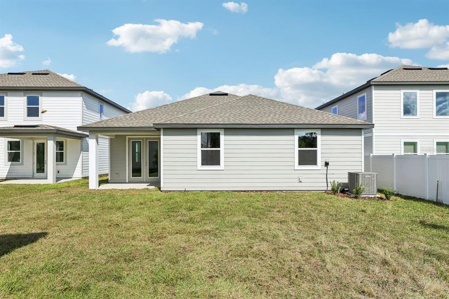 Exterior details and patio area of a home in Trailside, Mount Dora (Image 15).