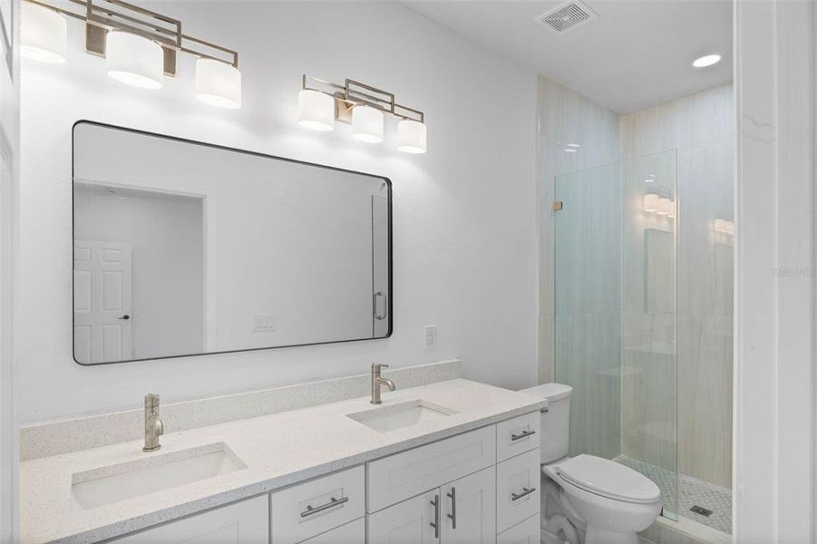 Primary bathroom with double vanities