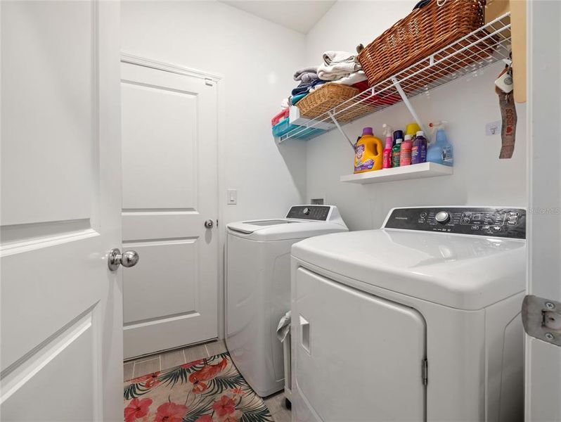 Laundry room off the hall closet to ensuite Bedroom 3