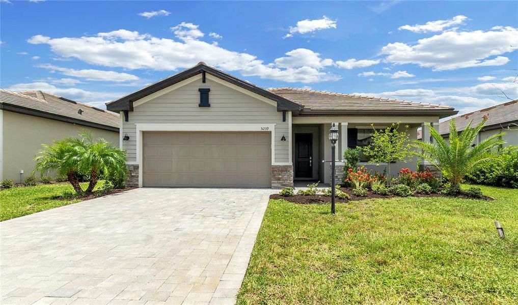 Front exterior of a new home in , Bradenton, FL, highlighting curb appeal (Image 18). Front exterior of a new home in , Bradenton, FL, highlighting curb appeal (Image 18).