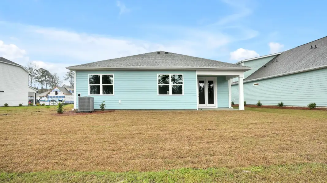 Representative exterior details of a home built from the Claiborne by D.R. Horton in The Highlands at Cedar Hill Landing, Navassa (Image 3).