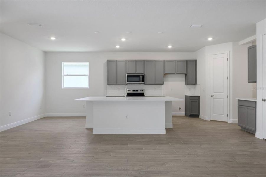 Furnished interior view inside a new home in Angeline, Land O' Lakes (Image 8).