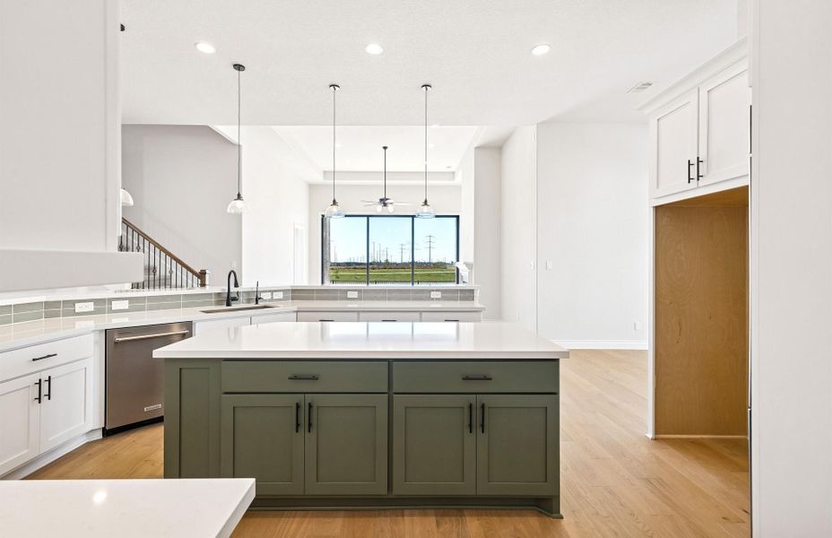 Furnished interior view inside a new home in Bridgeland 60′, Cypress (Image 6).