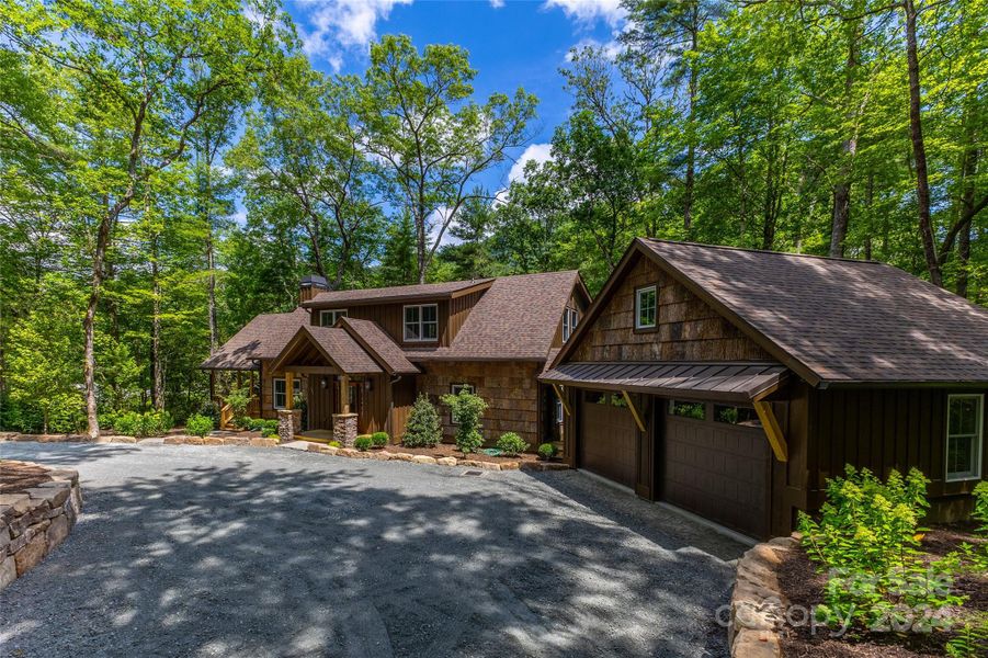 Front exterior of a new home in , Sapphire, NC, highlighting curb appeal (Image 18). Front exterior of a new home in , Sapphire, NC, highlighting curb appeal (Image 18).