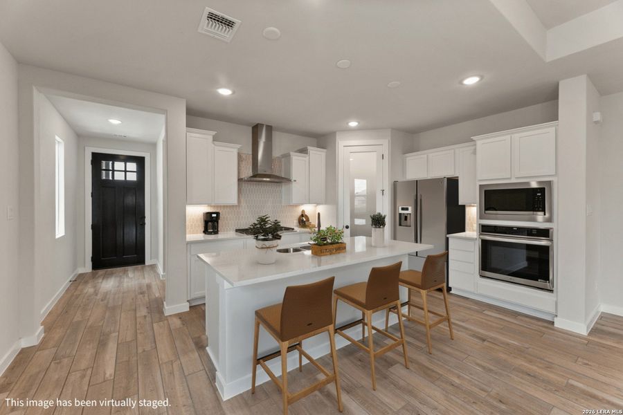 Furnished interior view inside a new home in Veranda Designer, San Antonio (Image 7).