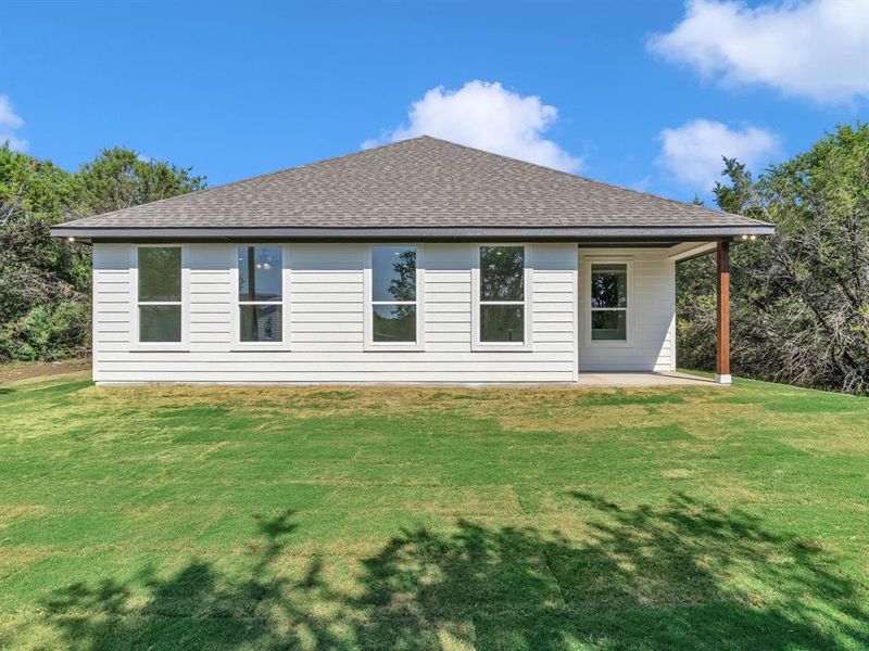 Front exterior of a new home in , Granbury, TX, highlighting curb appeal (Image 16). Front exterior of a new home in , Granbury, TX, highlighting curb appeal (Image 16).
