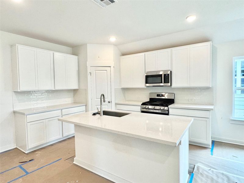 Furnished interior view inside a new home in Carillon, Manor (Image 6).