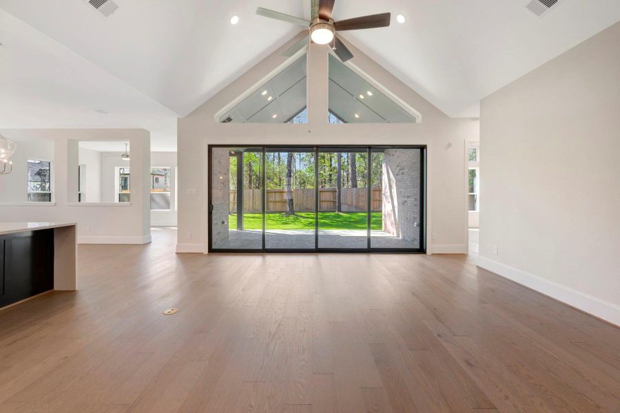 Spacious, unfurnished interior of a new home in The Woodlands Hills - Premier Collection, Willis (Image 21).