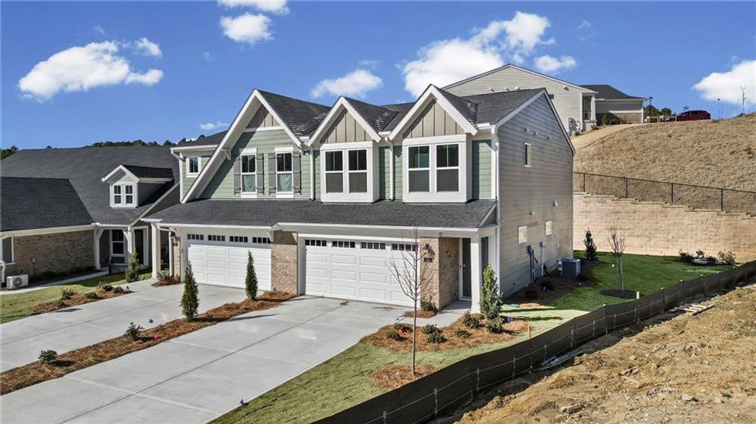 Front exterior of a new home in Villas at Gold Creek, Dawsonville, GA, highlighting curb appeal (Image 22).