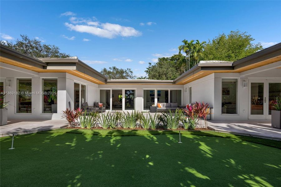 Front exterior of a new home in , Coral Gables, FL, highlighting curb appeal (Image 25).