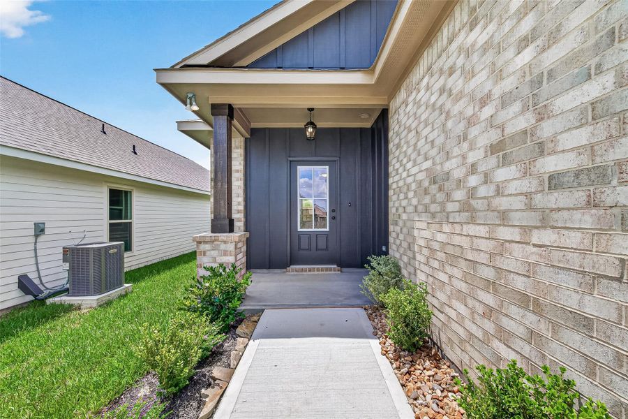Exterior details and patio area of a home in Mostyn Springs, Magnolia (Image 4).