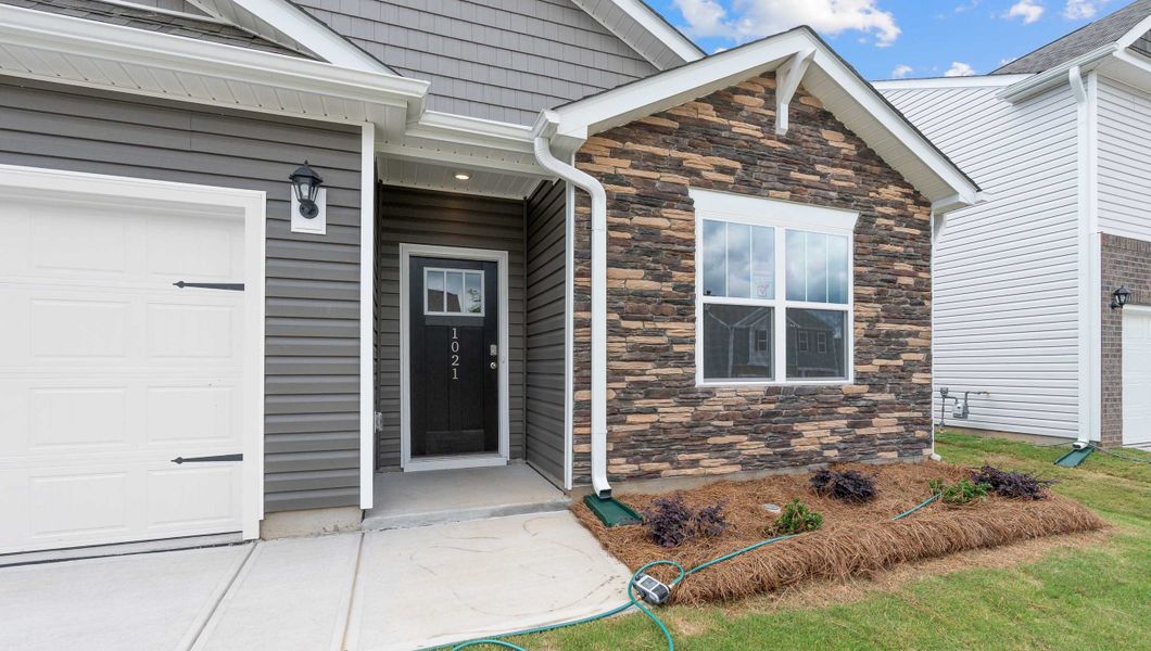 Front exterior of a new home in Woodhaven, Spartanburg, SC, highlighting curb appeal (Image 2).