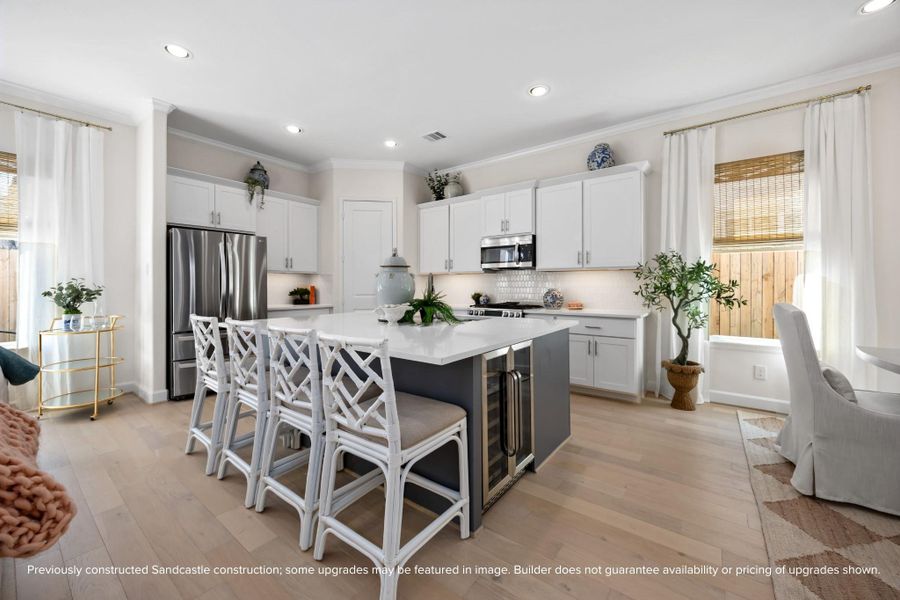 The kitchen that keeps up with your life. A generous quartz island, timeless cabinetry, and intuitive design make this space a joy—whether you’re prepping meals or pouring wine with friends.