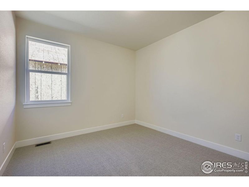 Spacious, unfurnished interior of a new home in RainDance National 60/70, Windsor (Image 20).