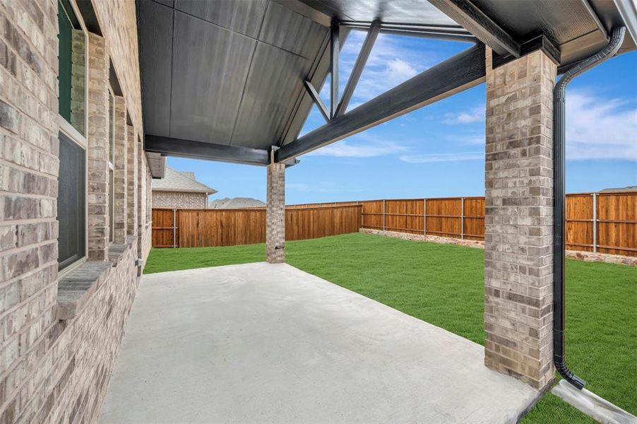 Exterior details and patio area of a home in Creekshaw, Royse City (Image 3).