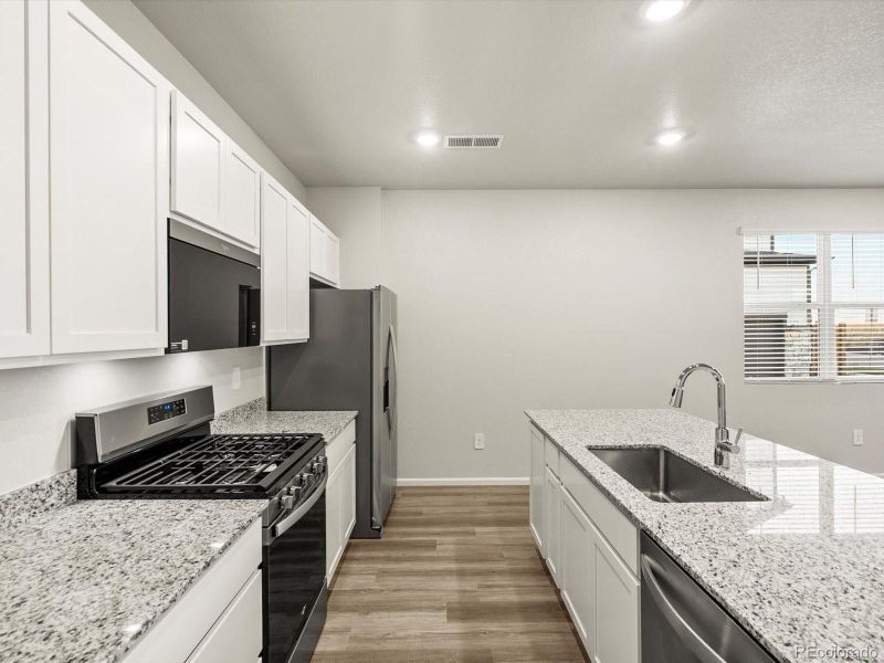 Furnished interior view inside a new home in , Aurora (Image 6).