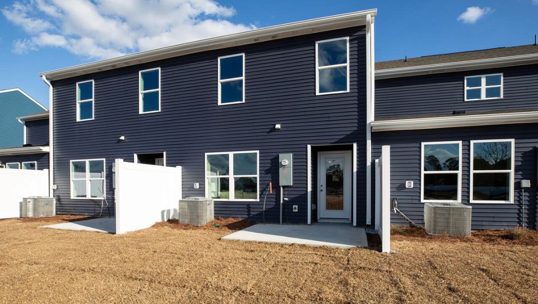 Representative exterior details of a home built from the PEARSON TH by D.R. Horton in Grayson Park Duets, Leland (Image 2).