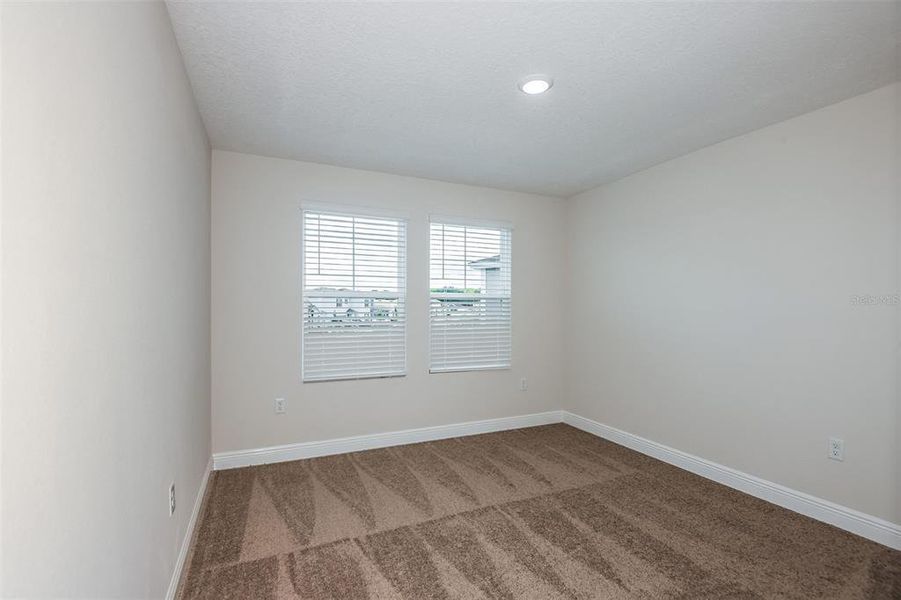 Spacious, unfurnished interior of a new home in Pasadena Landing, Wesley Chapel (Image 15).