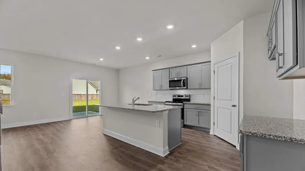 Furnished interior view inside a new home in Tyler - Home on the Lake, New Bern (Image 4).