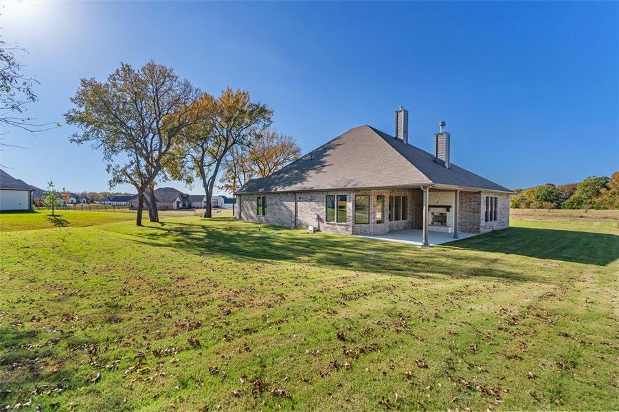Exterior details and patio area of a home in King Crossing Estates, Van Alstyne (Image 28). Exterior details and patio area of a home in King Crossing Estates, Van Alstyne (Image 28).