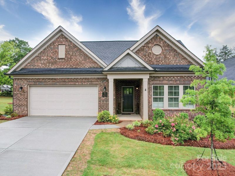 Front exterior of a new home in The Courtyards on New Hope, Gastonia, NC, highlighting curb appeal (Image 19).