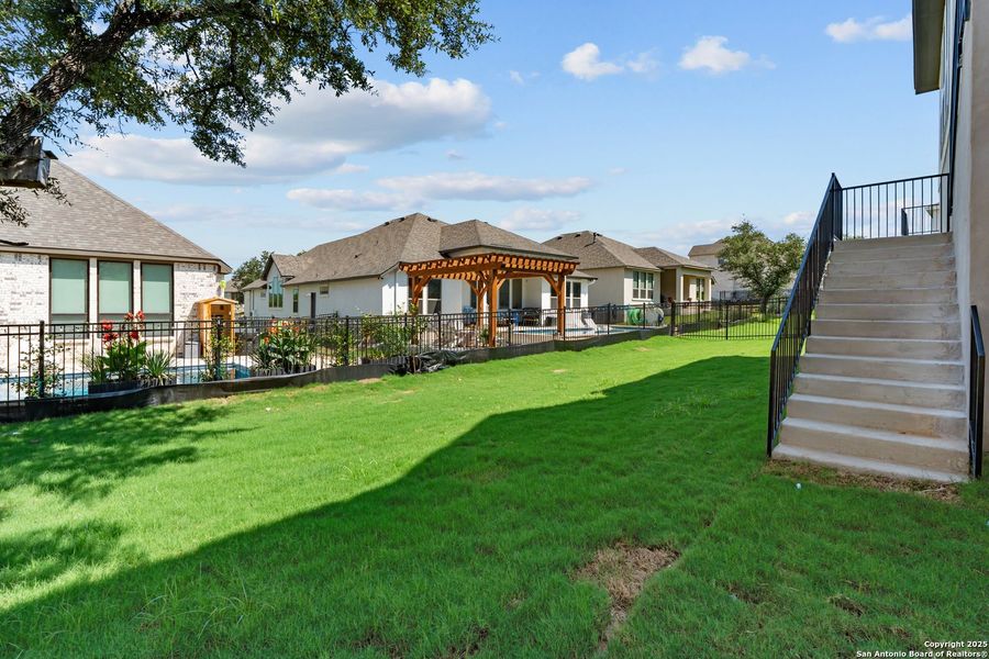Front exterior of a new home in Esperanza – New Phase Now Selling, Boerne, TX, highlighting curb appeal (Image 28). Front exterior of a new home in Esperanza – New Phase Now Selling, Boerne, TX, highlighting curb appeal (Image 28).