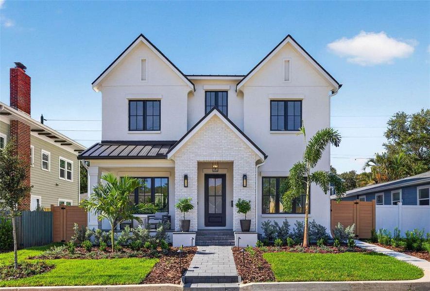 Front exterior of a new home in , St. Petersburg, FL, highlighting curb appeal (Image 2). Front exterior of a new home in , St. Petersburg, FL, highlighting curb appeal (Image 2).