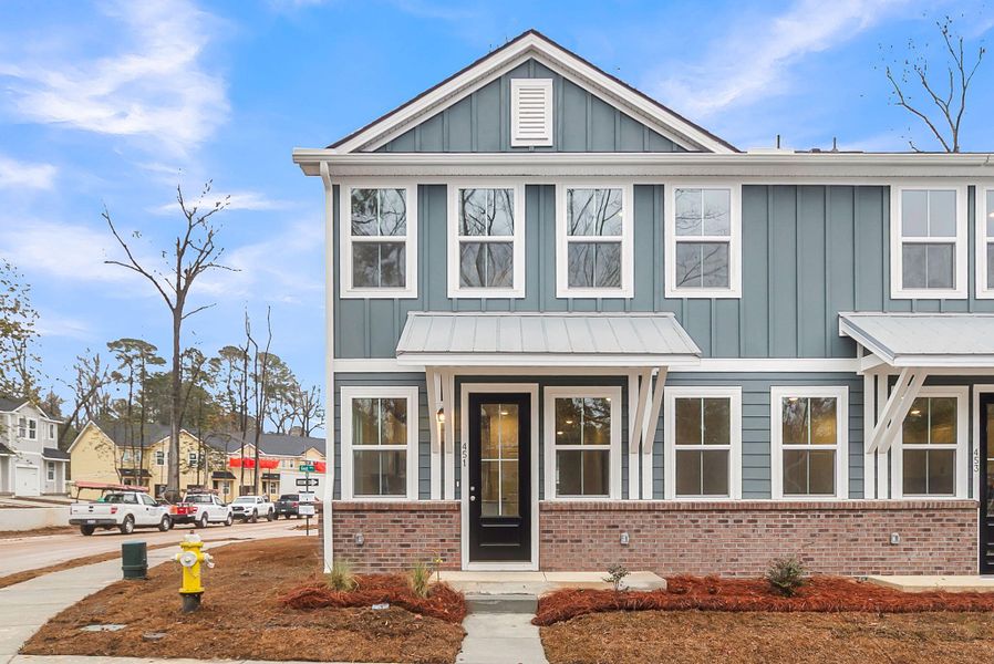 Front exterior of a new home in Windward Village, Summerville, SC, highlighting curb appeal (Image 2). Front exterior of a new home in Windward Village, Summerville, SC, highlighting curb appeal (Image 2).