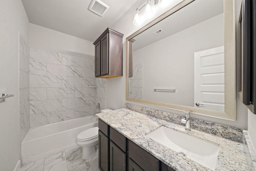 Furnished interior view inside a new home in Barton Creek Ranch, Conroe (Image 7). Furnished interior view inside a new home in Barton Creek Ranch, Conroe (Image 7).