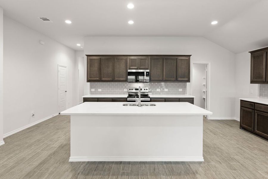 Representative exterior photo of a completed home built from the Lincoln by Impression Homes in DeBerry Reserve, Royse City, TX (Image 4).