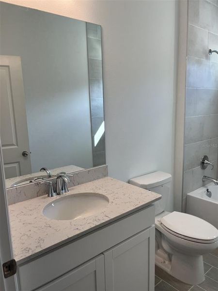 Furnished interior view inside a new home in Grand Park North, Dunnellon (Image 12).