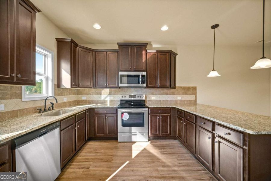 Furnished interior in a model home at Garden Walk in Jackson (Image 4).