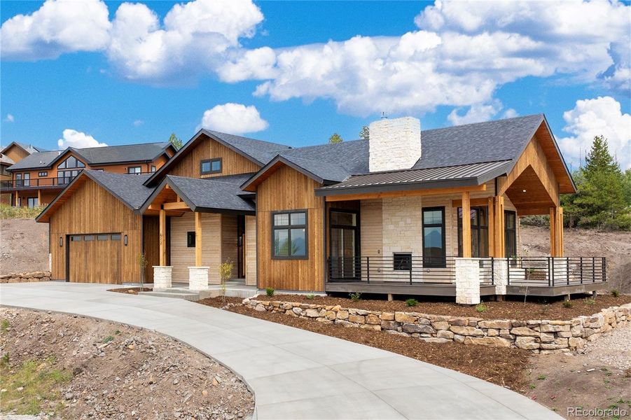 Front exterior of a new home in , Granby, CO, highlighting curb appeal (Image 28).
