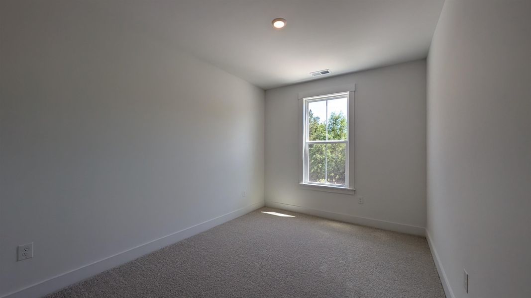 Spacious, unfurnished interior of a new home in Long Bay Golf Club, Longs (Image 33).