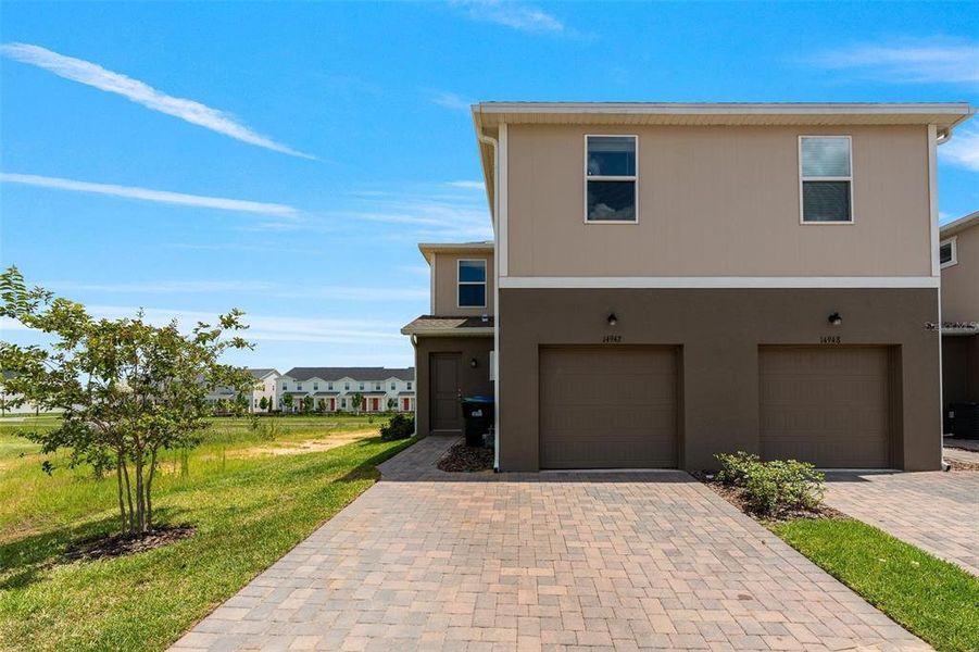 Front exterior of a new home in , Winter Garden, FL, highlighting curb appeal (Image 22).