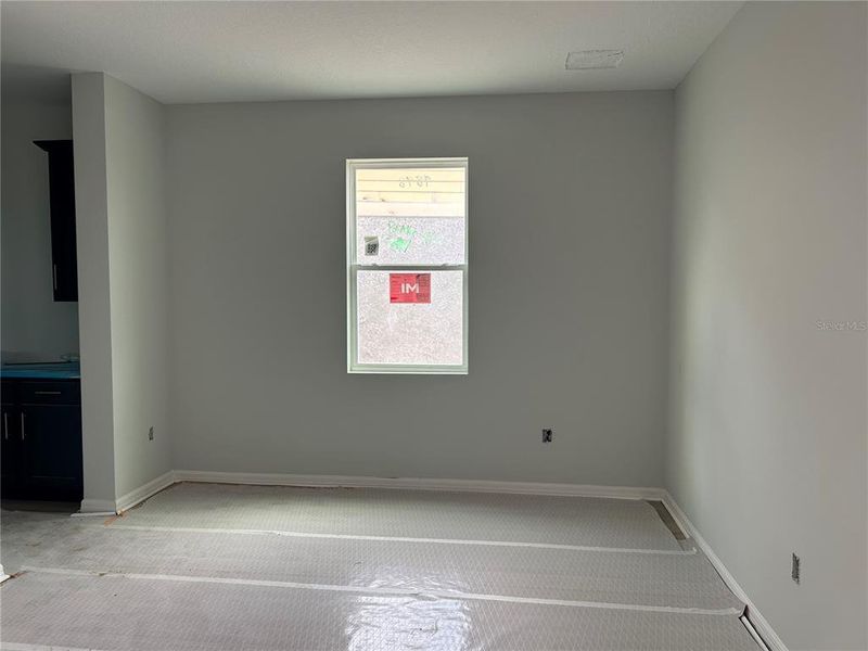 In-progress construction of a new home in Oakfield Trails Signature, Parrish, FL (Image 24).