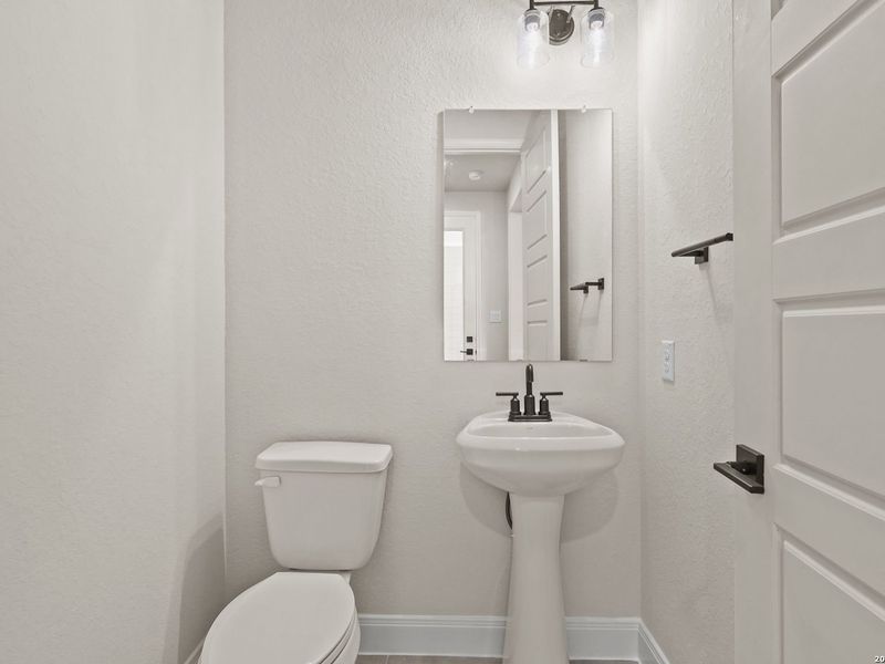 Furnished interior view inside a new home in Potranco Oaks, Castroville (Image 11).