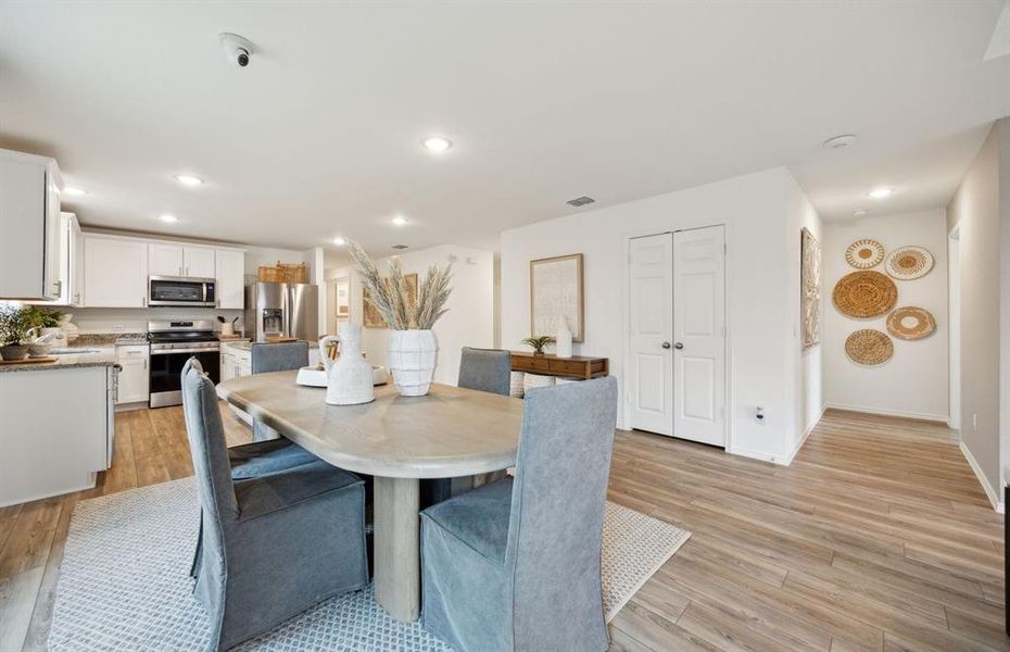 *Actual home, furniture not included - Dining area off kitchen with large windows