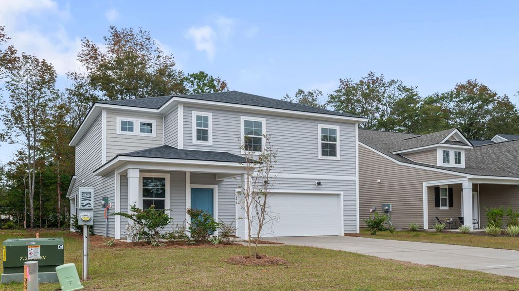 Front exterior of a new home in Creekside at Andrews, Summerville, SC, highlighting curb appeal (Image 19).