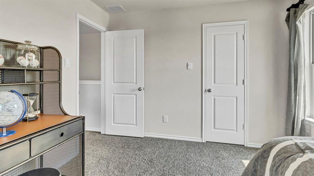 Neutral wall paint and textured carpeting Neutral wall paint and textured carpeting