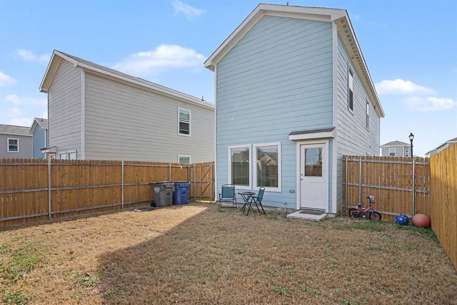 Exterior details and patio area of a home in Tillage Farms, Princeton (Image 4).