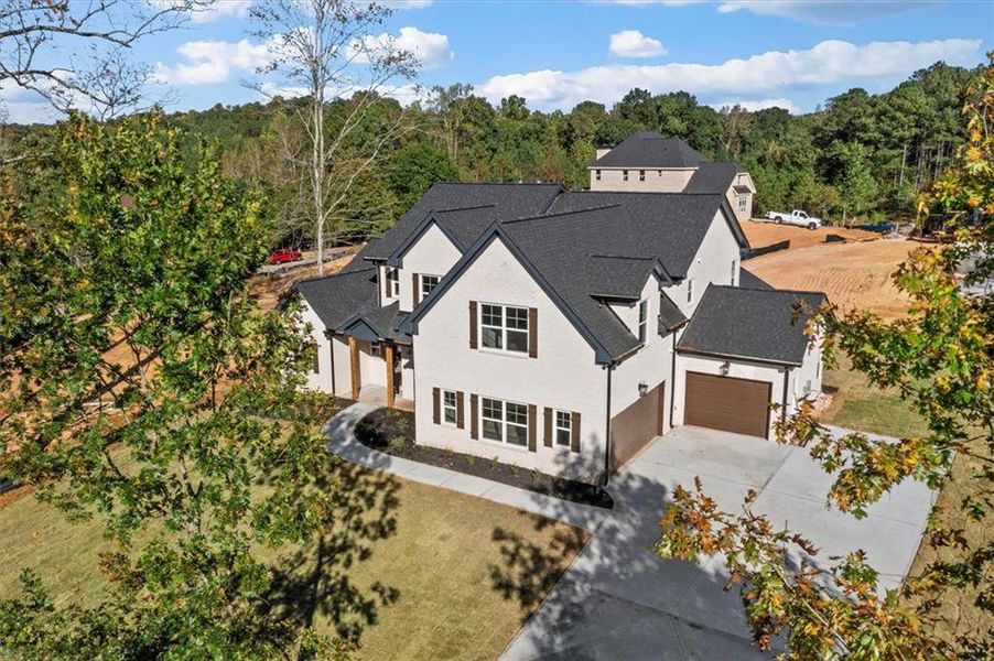 Front exterior of a new home in , Atlanta, GA, highlighting curb appeal (Image 28).