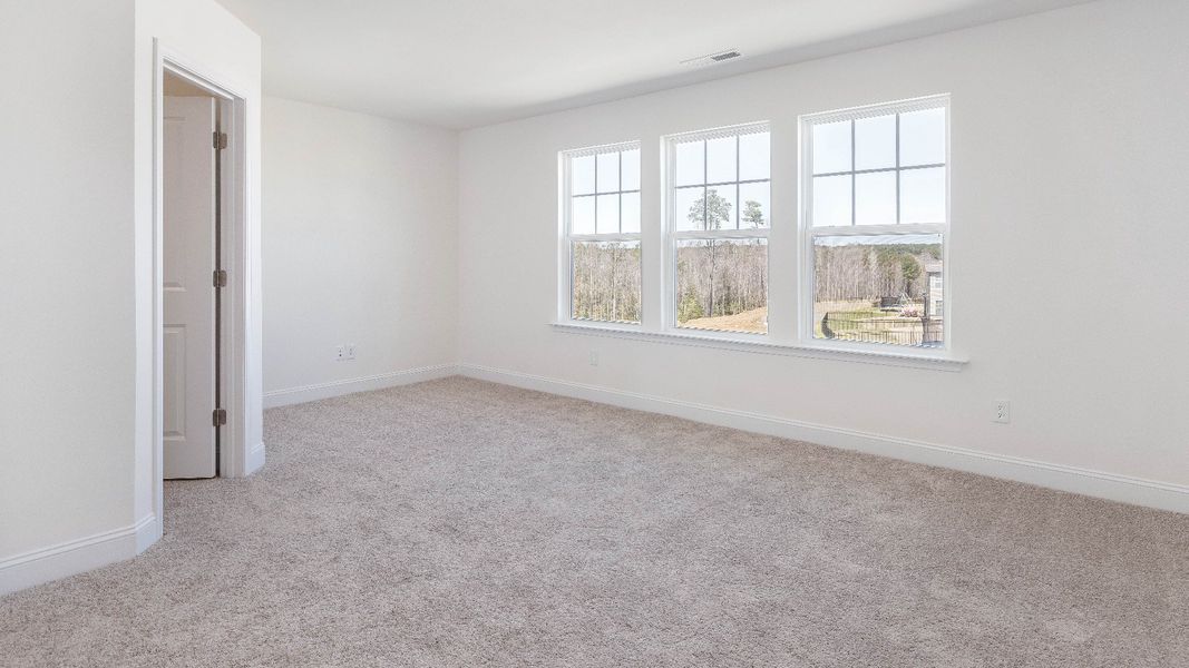 Furnished interior view inside a new home in Sidney Creek Townhomes, Zebulon (Image 15).