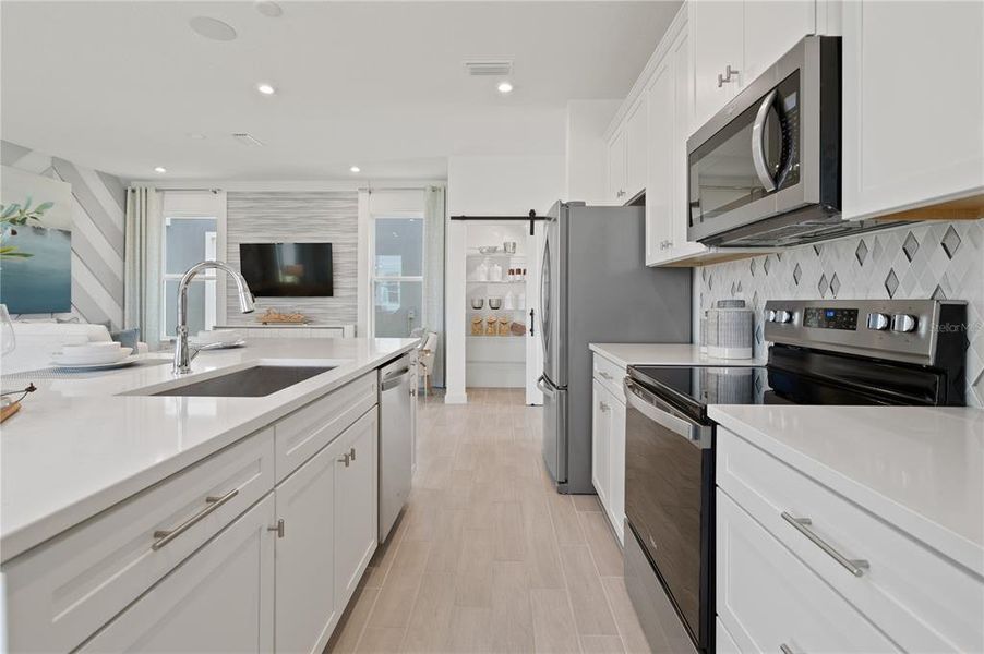 Furnished interior view inside a new home in Trinity Place, St. Cloud (Image 3). Furnished interior view inside a new home in Trinity Place, St. Cloud (Image 3).